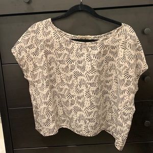 Partially opened back blouse